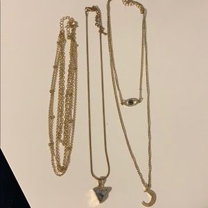 Assorted gold necklaces